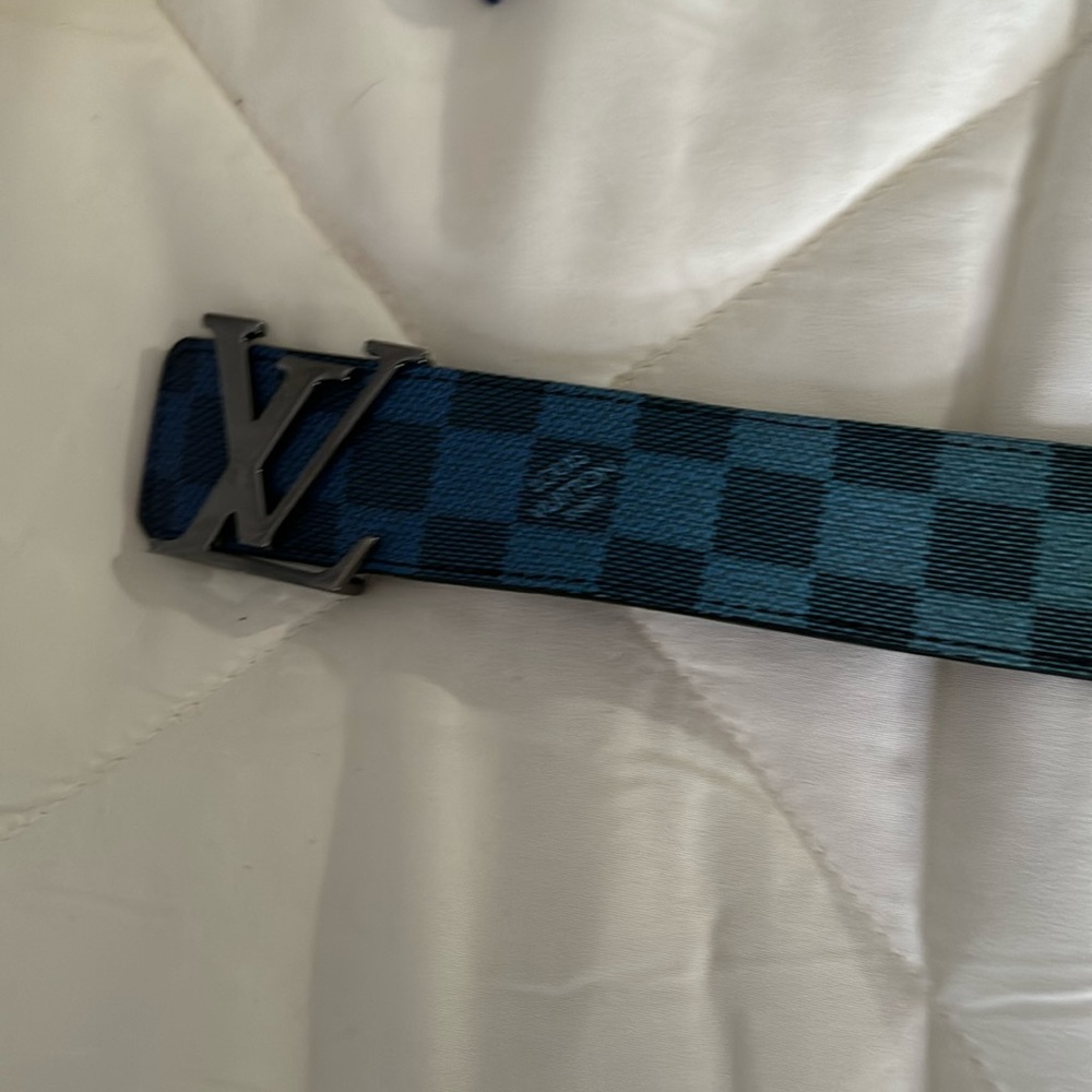 This is a used but in great condition Louie Vuitton rainbow belt